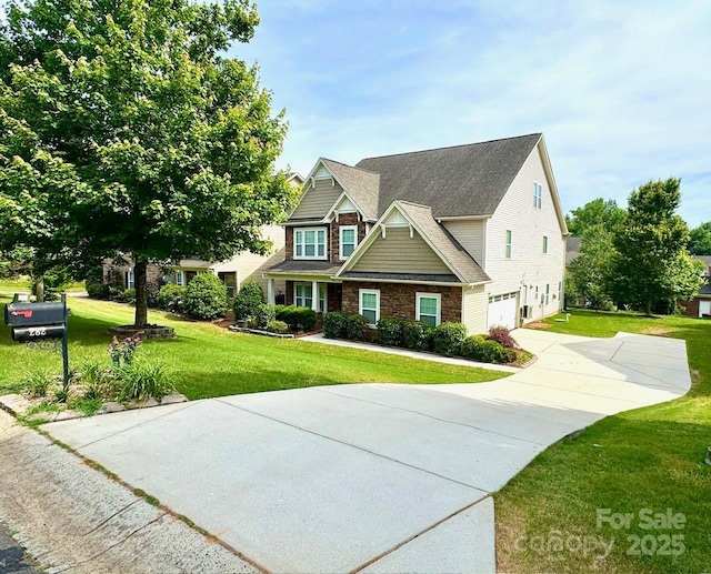 282 Fischer Rd, Fort Mill, SC 29175 - craftsman-style house with an attached garage, driveway, a front lawn, and stone siding