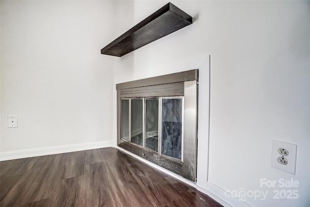 detailed view of wood finished floors and baseboards