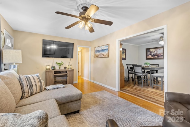 1792 Hoffman Rd, Gastonia, NC 28054 - living room with ceiling fan, wood finished floors, and baseboards