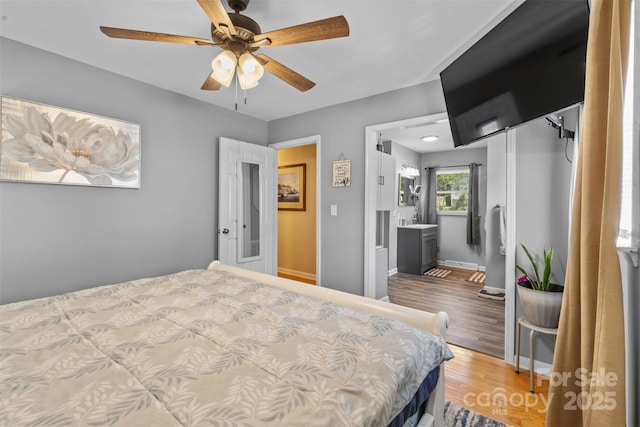 1792 Hoffman Rd, Gastonia, NC 28054 - bedroom with wood finished floors, baseboards, and a ceiling fan