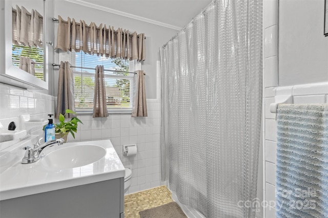 1792 Hoffman Rd, Gastonia, NC 28054 - bathroom featuring tile walls, toilet, vanity, crown molding, and curtained shower
