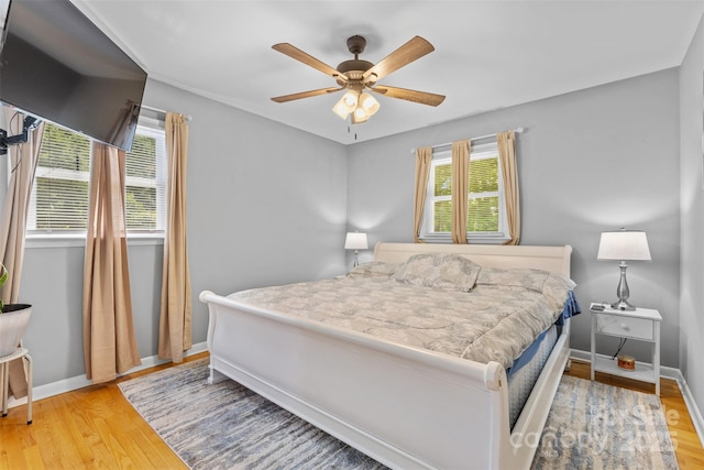 1792 Hoffman Rd, Gastonia, NC 28054 - bedroom featuring wood finished floors, baseboards, and ceiling fan
