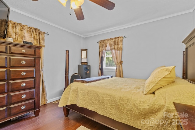 1792 Hoffman Rd, Gastonia, NC 28054 - bedroom with dark wood-type flooring, ornamental molding, and ceiling fan