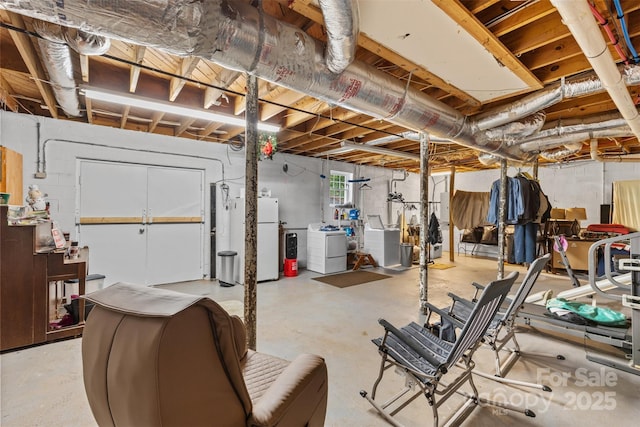 1792 Hoffman Rd, Gastonia, NC 28054 - below grade area with washing machine and dryer and freestanding refrigerator