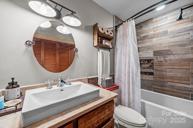 full bathroom featuring vanity, shower / bath combo, and toilet
