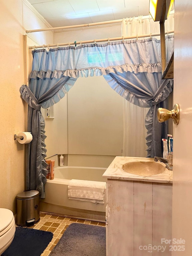 full bathroom with vanity, shower / bathtub combination with curtain, and toilet