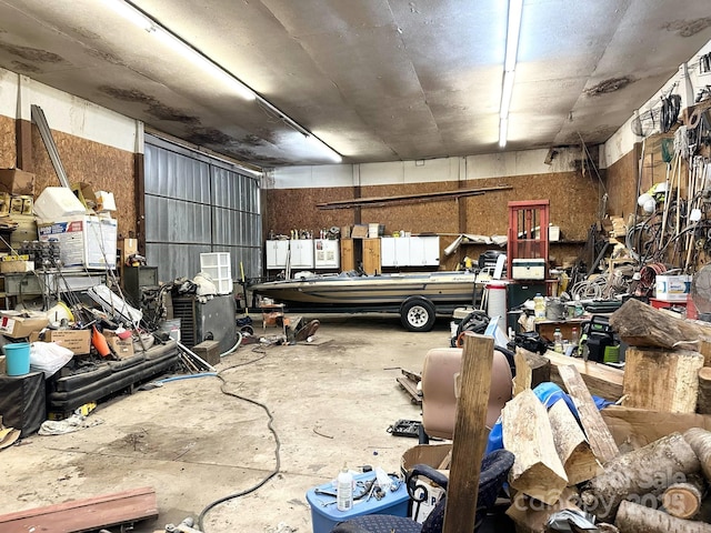 garage with a workshop area