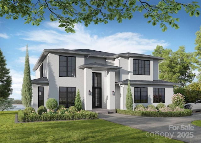 242 Shoreline Loop, Mooresville, NC 28117 - view of front facade featuring stucco siding and a front lawn