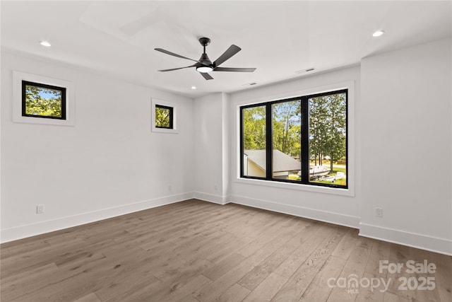 242 Shoreline Loop, Mooresville, NC 28117 - spare room with recessed lighting, wood finished floors, and a ceiling fan