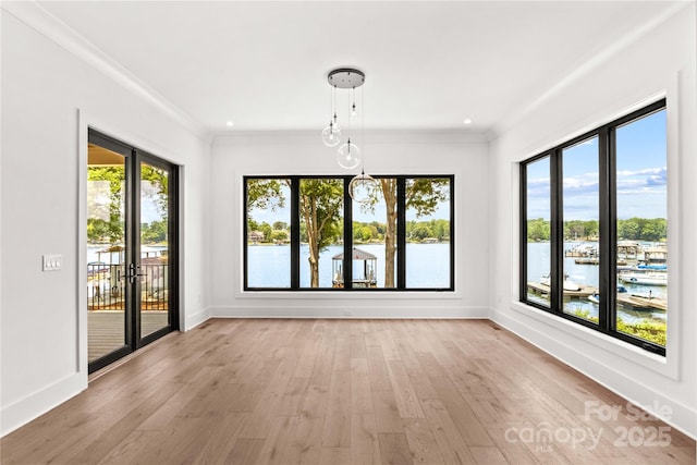242 Shoreline Loop, Mooresville, NC 28117 - unfurnished sunroom featuring wood-type flooring, a water view, french doors, and ornamental molding