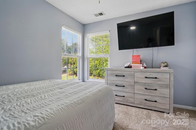 8833 Cavonnier Ln, Charlotte, NC 28216 - bedroom featuring light carpet and baseboards