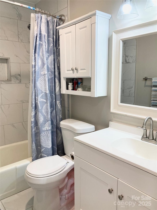 bathroom with vanity, shower / bath combination with curtain, and toilet