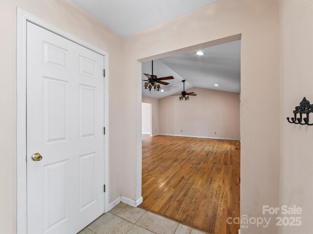 316 Big Raven Ln, Saluda, NC 28773 - entryway featuring a ceiling fan, lofted ceiling, baseboards, and light tile patterned flooring