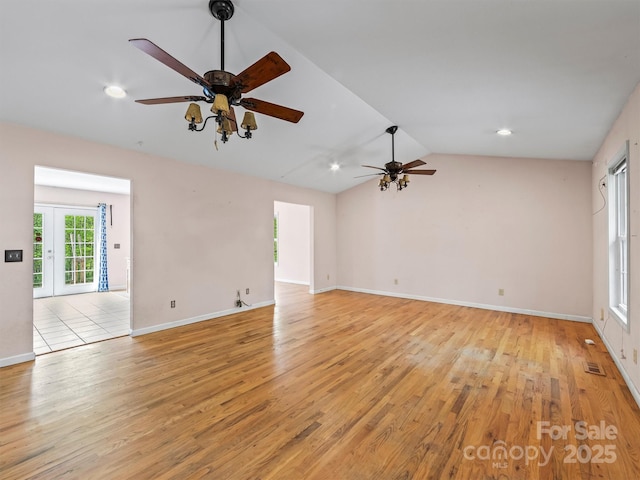 316 Big Raven Ln, Saluda, NC 28773 - spare room with light wood finished floors, a ceiling fan, lofted ceiling, baseboards, and recessed lighting