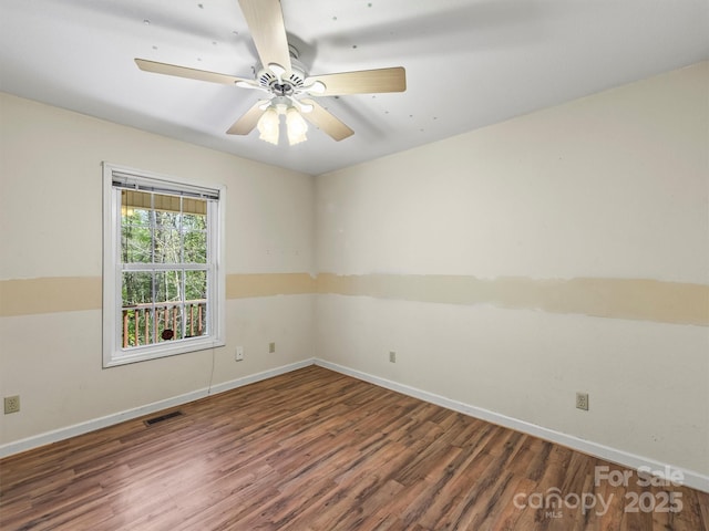 316 Big Raven Ln, Saluda, NC 28773 - empty room with wood finished floors, baseboards, and ceiling fan