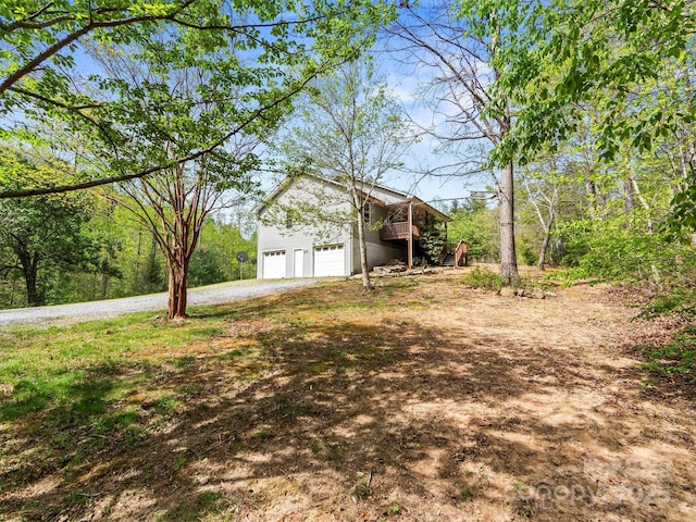 316 Big Raven Ln, Saluda, NC 28773 - view of yard featuring driveway and a wooden deck