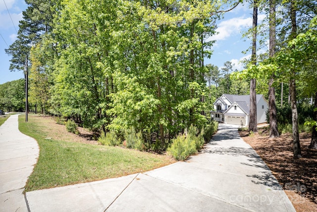 16432 Here At Last Ln, Charlotte, NC 28278 - exterior space featuring a yard and driveway