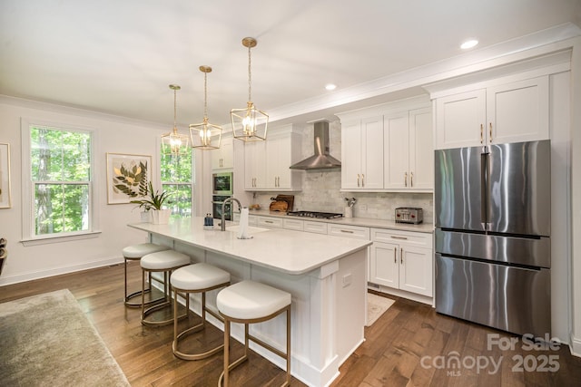 16432 Here At Last Ln, Charlotte, NC 28278 - kitchen featuring dark wood finished floors, appliances with stainless steel finishes, wall chimney range hood, and white cabinetry