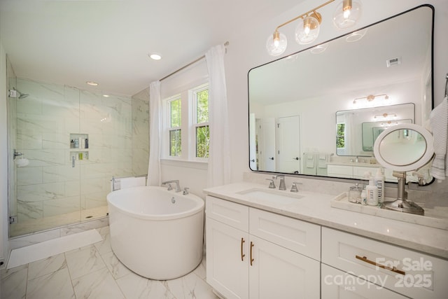 16432 Here At Last Ln, Charlotte, NC 28278 - full bathroom with marble finish floor, a freestanding bath, a wealth of natural light, and a shower stall