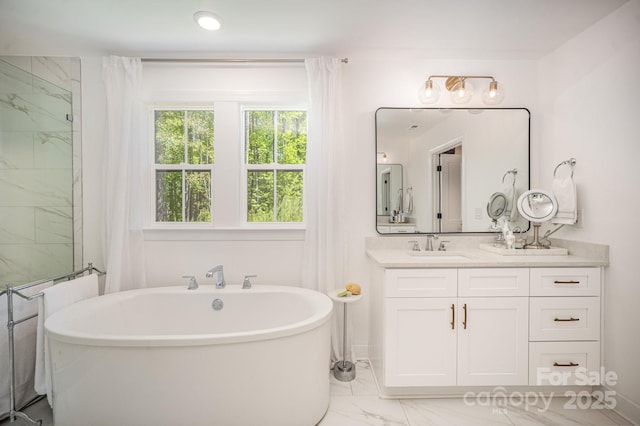 16432 Here At Last Ln, Charlotte, NC 28278 - bathroom with vanity, a soaking tub, and marble finish floor