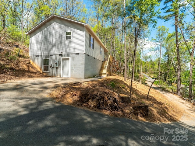 66 Avondale Heights Rd, Asheville, NC 28803 - view of property exterior with stairway and driveway
