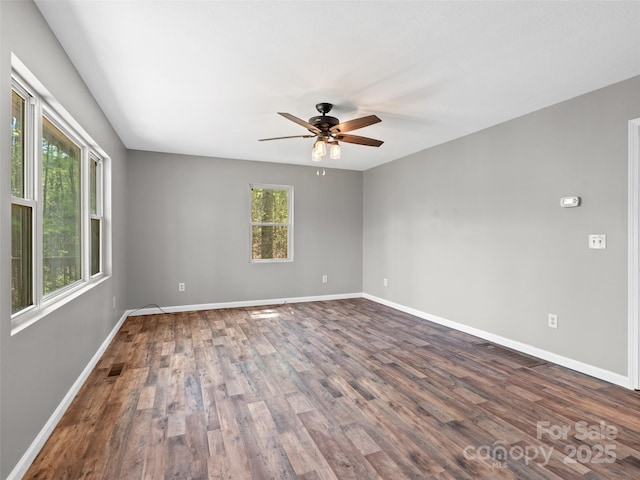 66 Avondale Heights Rd, Asheville, NC 28803 - unfurnished room with ceiling fan and dark wood finished floors