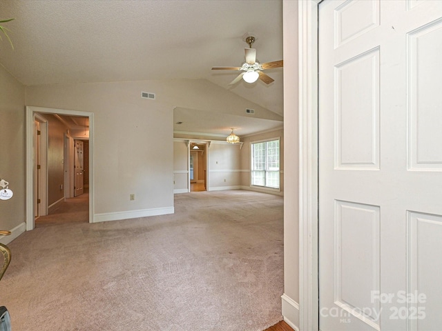 2919 Peachwood Ct, Fort Mill, SC 29715 - unfurnished living room featuring vaulted ceiling, carpet floors, ceiling fan, and baseboards