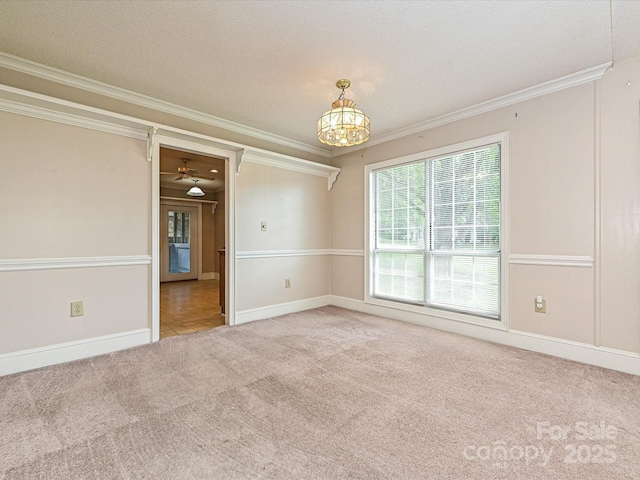 2919 Peachwood Ct, Fort Mill, SC 29715 - carpeted empty room with crown molding, baseboards, a chandelier, and a textured ceiling