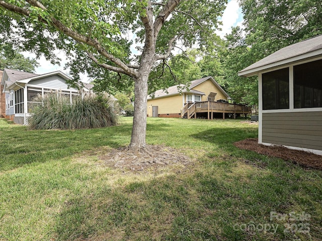 2919 Peachwood Ct, Fort Mill, SC 29715 - view of grassy yard featuring a sunroom and a wooden deck
