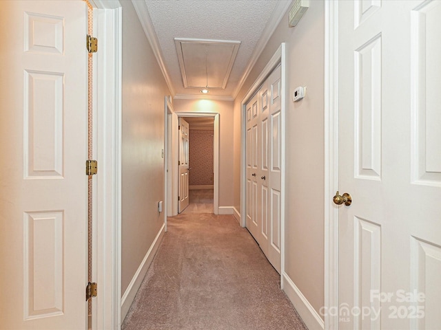 2919 Peachwood Ct, Fort Mill, SC 29715 - hall with attic access, light colored carpet, crown molding, a textured ceiling, and baseboards
