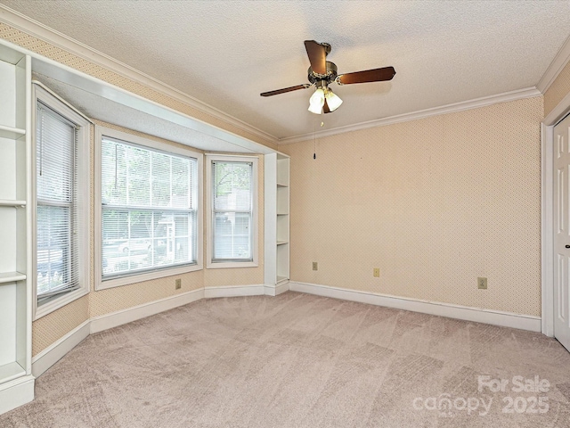 2919 Peachwood Ct, Fort Mill, SC 29715 - unfurnished room featuring crown molding, carpet, a ceiling fan, baseboards, and a textured ceiling