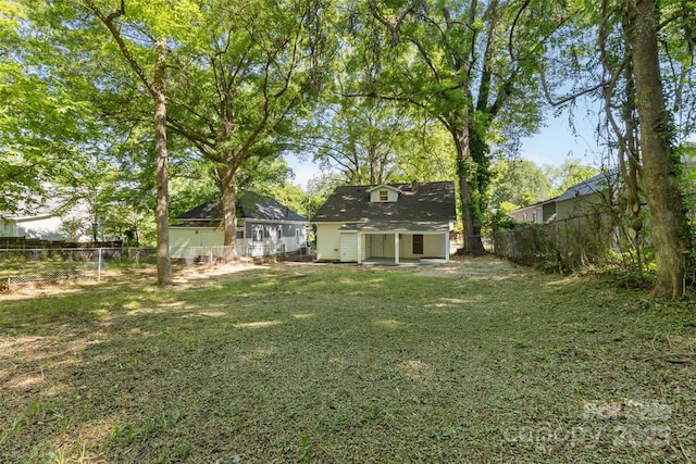 view of yard featuring fence