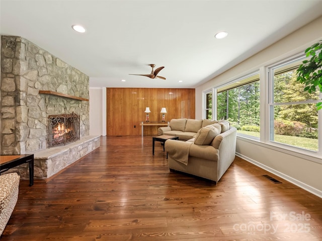 100 Ashton Ln, Brevard, NC 28712 - living area featuring a stone fireplace, ceiling fan, wood finished floors, recessed lighting, and baseboards