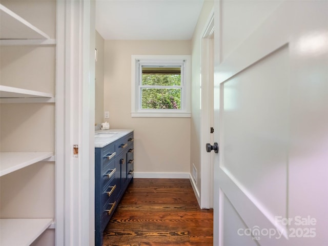 100 Ashton Ln, Brevard, NC 28712 - bathroom featuring wood finished floors, baseboards, and vanity
