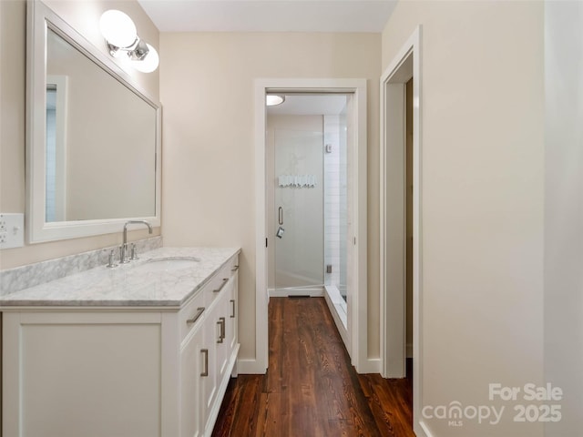 100 Ashton Ln, Brevard, NC 28712 - full bathroom with wood finished floors, a shower stall, and vanity