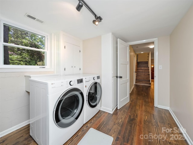 100 Ashton Ln, Brevard, NC 28712 - laundry area featuring dark wood-type flooring, washer and dryer, and baseboards