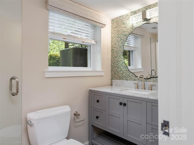 100 Ashton Ln, Brevard, NC 28712 - bathroom with toilet, plenty of natural light, and vanity