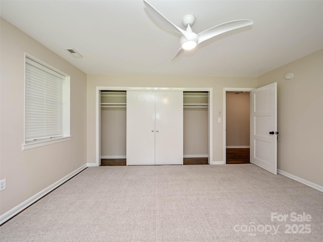 100 Ashton Ln, Brevard, NC 28712 - unfurnished bedroom with carpet, a closet, ceiling fan, and baseboards
