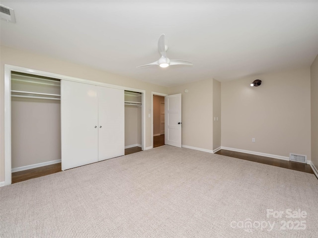 100 Ashton Ln, Brevard, NC 28712 - unfurnished bedroom with baseboards, a ceiling fan, a closet, and carpet