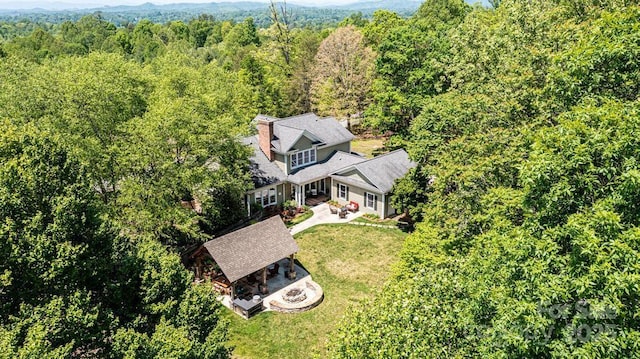 aerial view with a wooded view