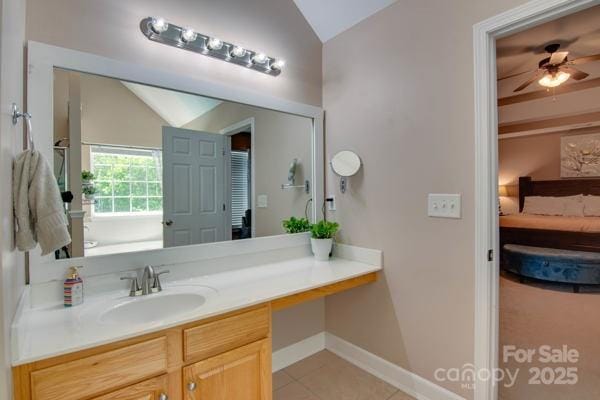 136 Elba Dr, Mooresville, NC 28115 - bathroom featuring vaulted ceiling, connected bathroom, vanity, ceiling fan, and tile patterned floors