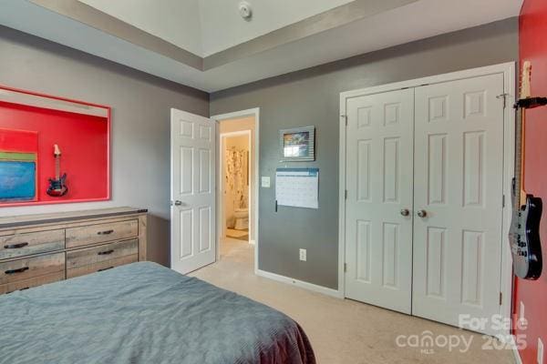 136 Elba Dr, Mooresville, NC 28115 - carpeted bedroom featuring baseboards and a closet