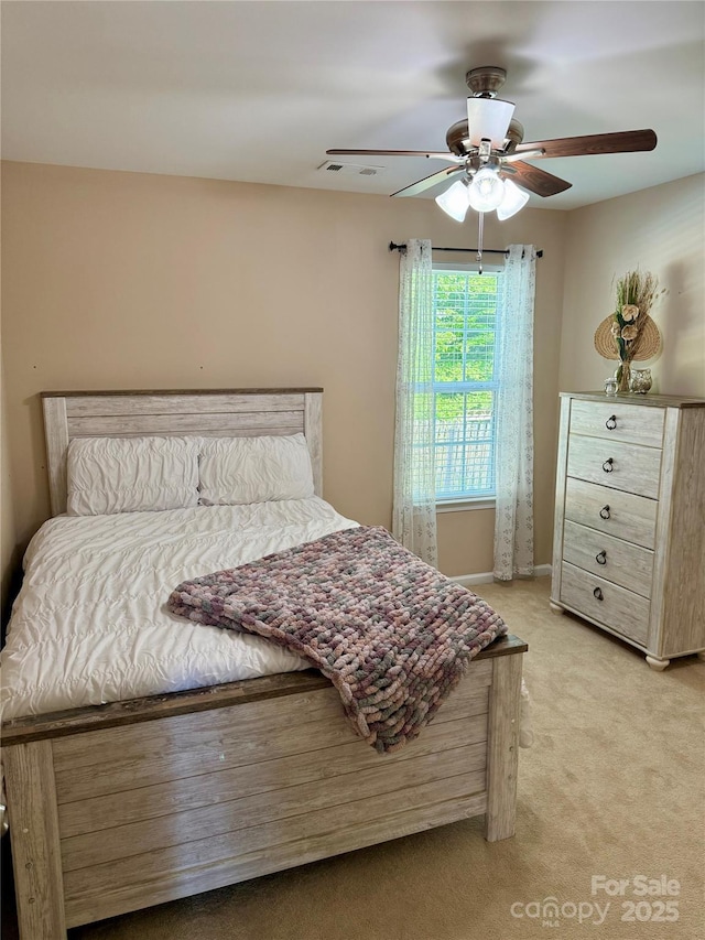 136 Elba Dr, Mooresville, NC 28115 - bedroom with light colored carpet and a ceiling fan