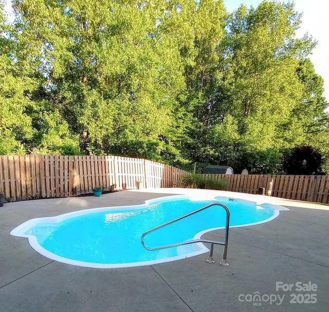 136 Elba Dr, Mooresville, NC 28115 - view of swimming pool featuring a fenced backyard and a patio