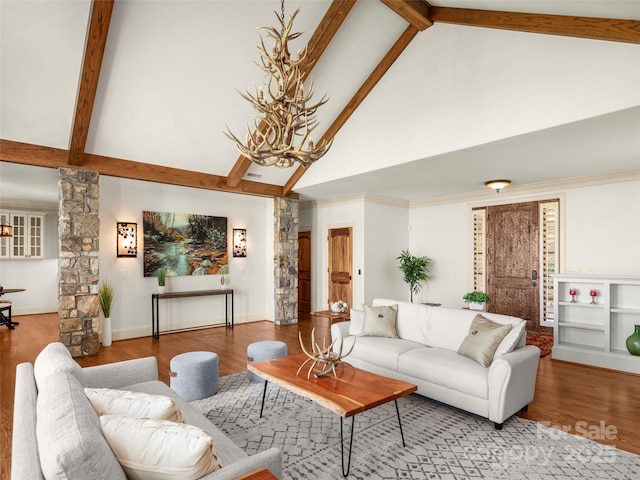 714 Wickhams Fancy Dr, Biltmore Lake, NC 28715 - living room with beamed ceiling, high vaulted ceiling, ornate columns, and wood finished floors