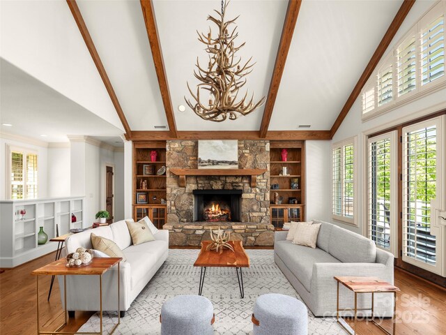 714 Wickhams Fancy Dr, Biltmore Lake, NC 28715 - living room featuring wood finished floors, beam ceiling, and built in shelves