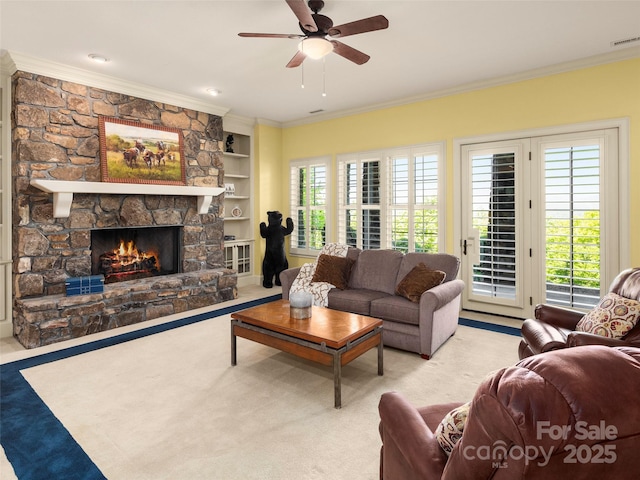 714 Wickhams Fancy Dr, Biltmore Lake, NC 28715 - living area with crown molding, a stone fireplace, a wealth of natural light, and a ceiling fan
