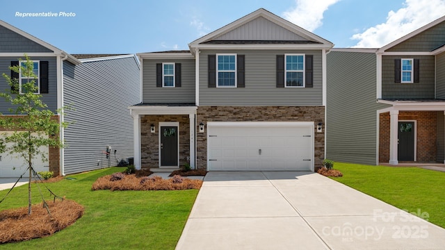 135 Meadow View Dr, Statesville, NC 28677 - view of front of house featuring an attached garage, a front yard, driveway, and stone siding
