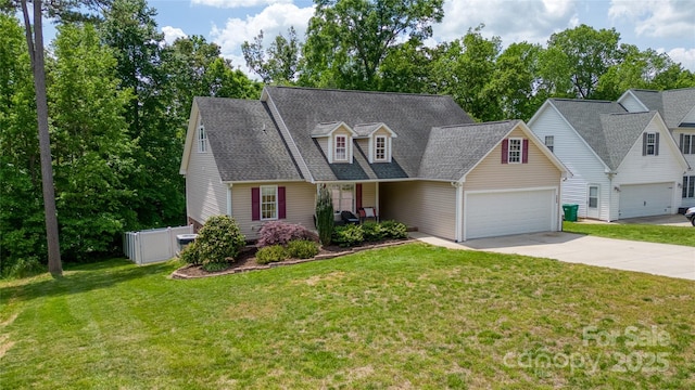 208 N Kayla Dr, Salisbury, NC 28146 - cape cod home featuring concrete driveway, roof with shingles, an attached garage, and a front yard