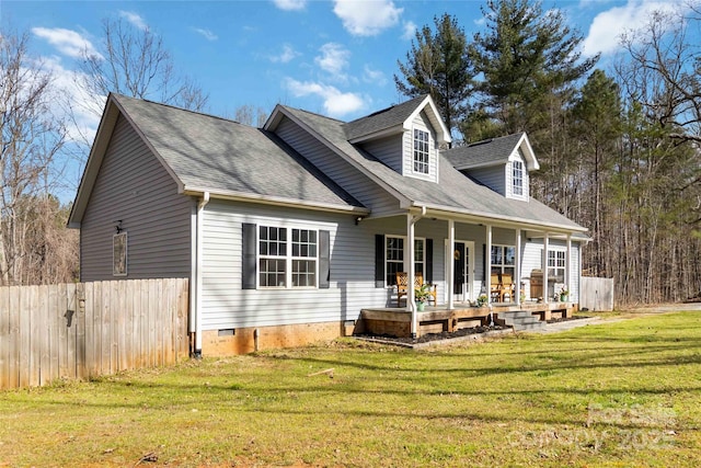 back of property featuring a porch, crawl space, a lawn, fence, and a shingled roof